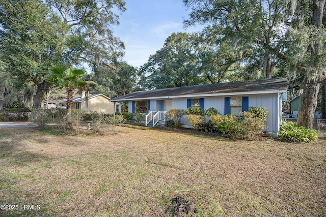 ranch-style home with a front yard