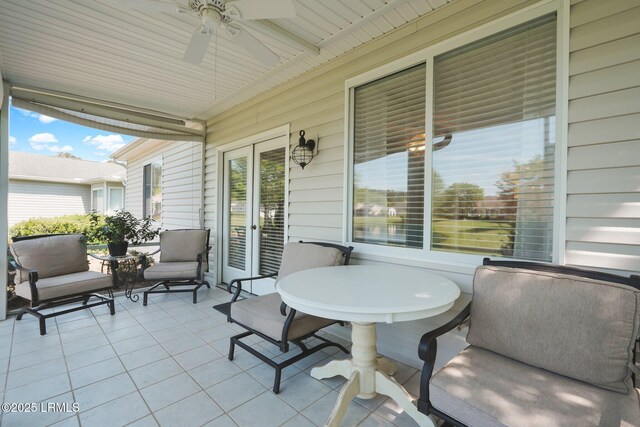 view of patio featuring ceiling fan and french doors