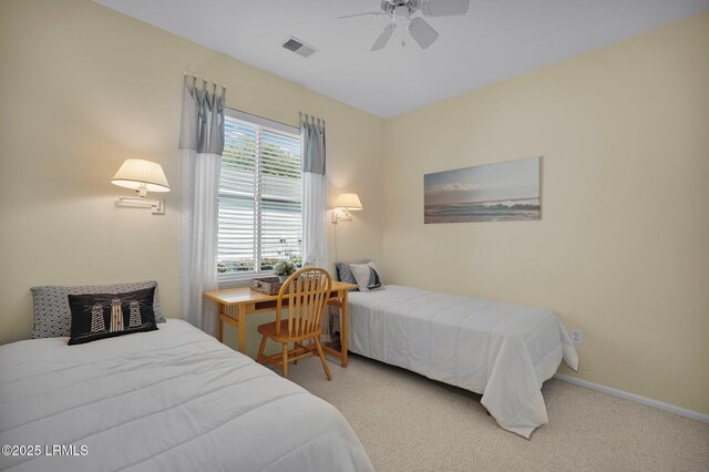 bedroom with ceiling fan, baseboards, visible vents, and carpet