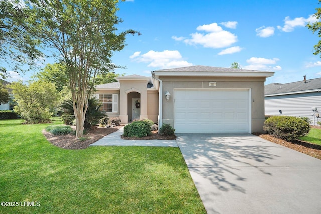 view of front of home with stucco siding, an attached garage, a front yard, and concrete driveway