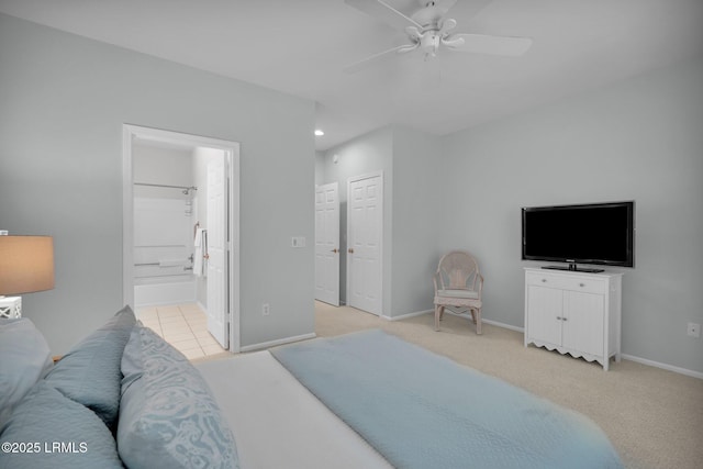 bedroom featuring ensuite bathroom, ceiling fan, light colored carpet, baseboards, and recessed lighting