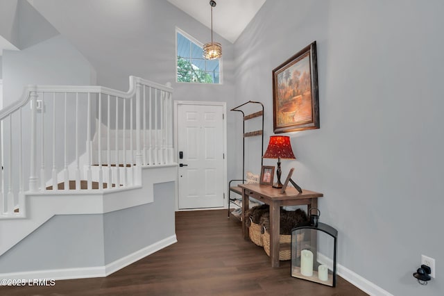 50 Lake Linden Ln Unit 50, Bluffton, SC 29910 - foyer with baseboards, dark wood-style flooring, a chandelier, and high vaulted ceiling