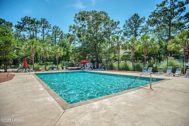 50 Lake Linden Ln Unit 50, Bluffton, SC 29910 - community pool featuring a patio and fence