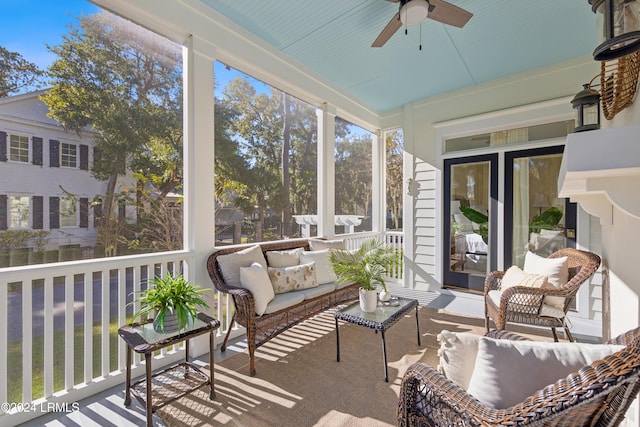 sunroom / solarium with ceiling fan