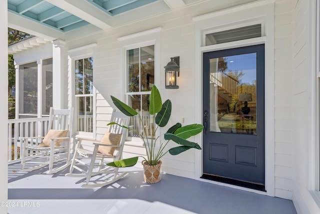 doorway to property with a porch