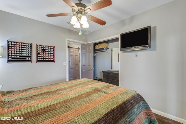 618 Dolphin Anx, Fripp Island, SC 29920 - bedroom with a closet, a ceiling fan, and baseboards