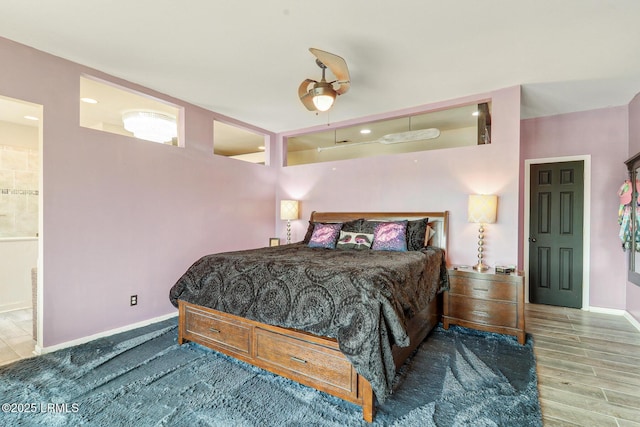 618 Dolphin Anx, Fripp Island, SC 29920 - bedroom with baseboards, ceiling fan, and wood finished floors