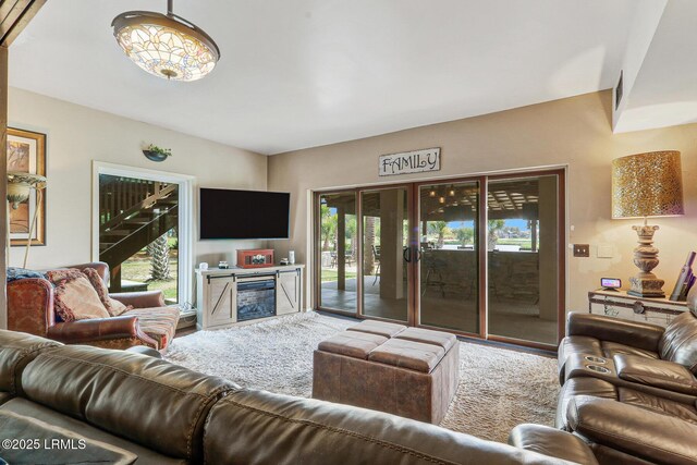 618 Dolphin Anx, Fripp Island, SC 29920 - living room featuring plenty of natural light and a fireplace