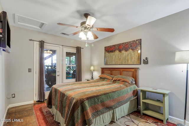 618 Dolphin Anx, Fripp Island, SC 29920 - bedroom with baseboards, attic access, access to exterior, and ceiling fan