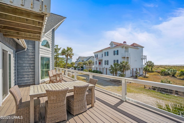 wooden deck with a residential view