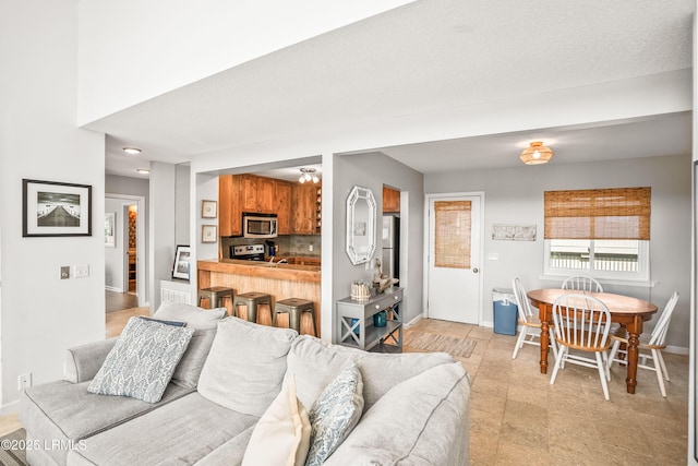 living room with baseboards