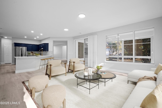 living room featuring light wood-type flooring