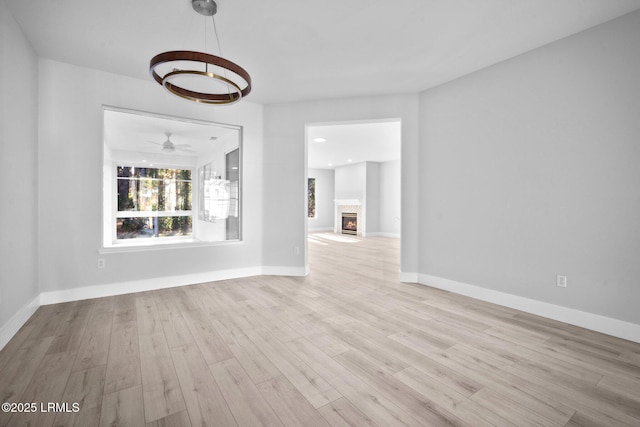 unfurnished living room with light hardwood / wood-style floors