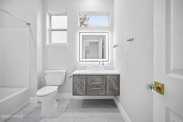 full bathroom with vanity, shower / washtub combination, and toilet