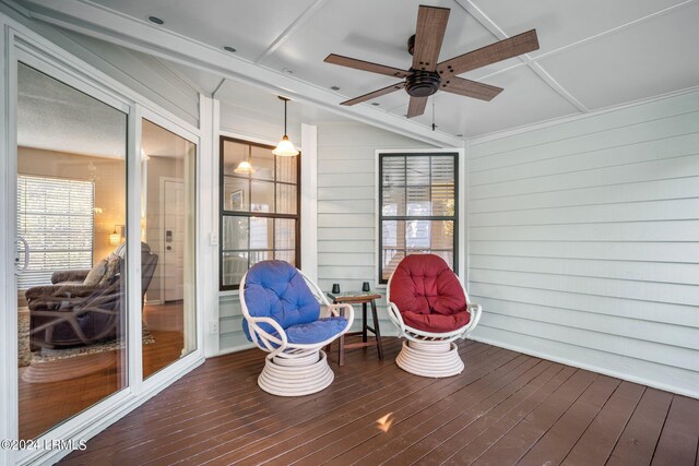 wooden terrace featuring ceiling fan