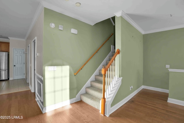 2176 Blakers Blvd, Okatie, SC 29909 - stairs with baseboards, wood finished floors, and crown molding