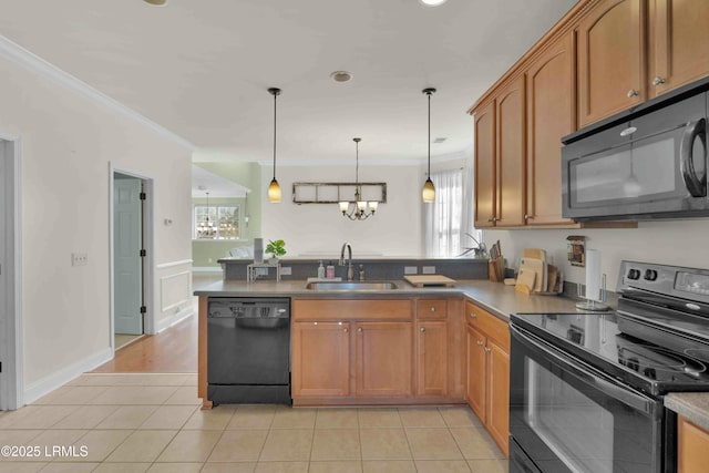 2176 Blakers Blvd, Okatie, SC 29909 - kitchen with black appliances, ornamental molding, a peninsula, and a sink