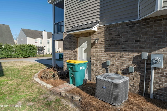 2176 Blakers Blvd, Okatie, SC 29909 - exterior details featuring electric meter, central AC unit, and brick siding