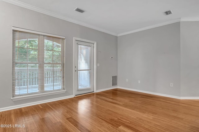 380 Marshland Rd Unit E26, Hilton Head Island, SC 29926 - unfurnished room featuring wood finished floors and ornamental molding