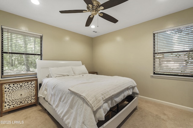 96 Pine Forest Loop, Ridgeland, SC 29936 - bedroom featuring multiple windows, light carpet, baseboards, recessed lighting, and ceiling fan