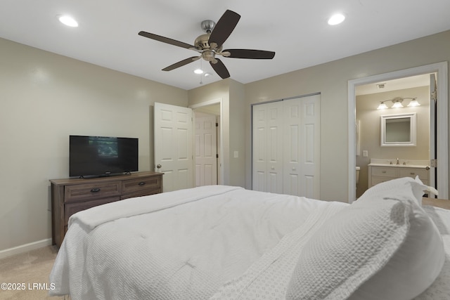 96 Pine Forest Loop, Ridgeland, SC 29936 - bedroom with light carpet, baseboards, a closet, connected bathroom, and ceiling fan