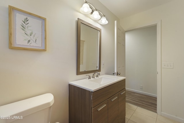 96 Pine Forest Loop, Ridgeland, SC 29936 - bathroom featuring toilet, vanity, tile patterned flooring, and baseboards