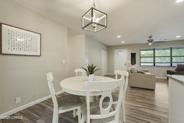 96 Pine Forest Loop, Ridgeland, SC 29936 - dining area with wood finished floors, baseboards, recessed lighting, ceiling fan, and a chandelier