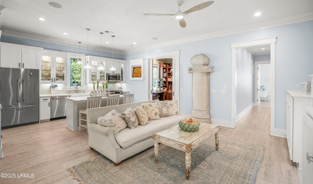 3 Veridian Park E, Beaufort, SC 29907 - living area featuring a ceiling fan, light wood-style flooring, recessed lighting, crown molding, and baseboards