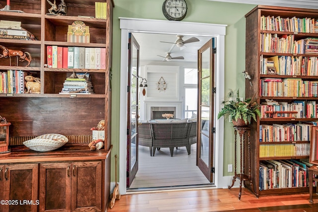 3 Veridian Park E, Beaufort, SC 29907 - sitting room with a ceiling fan, wood finished floors, and a fireplace