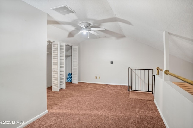900 Brotherhood Rd Unit J6, Beaufort, SC 29902 - interior space featuring baseboards, visible vents, carpet, lofted ceiling, and ceiling fan