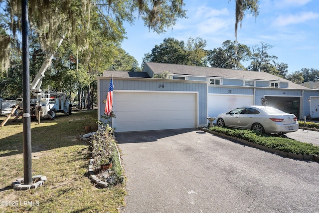 900 Brotherhood Rd Unit J6, Beaufort, SC 29902 - garage featuring driveway