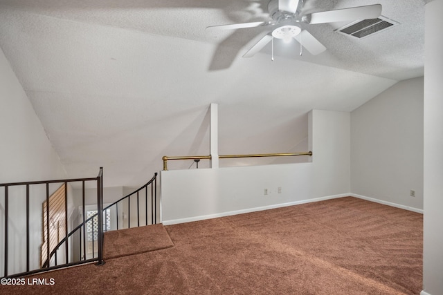900 Brotherhood Rd Unit J6, Beaufort, SC 29902 - bonus room featuring lofted ceiling, visible vents, a ceiling fan, a textured ceiling, and carpet flooring