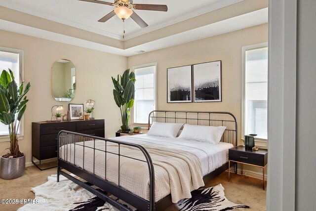 bedroom featuring carpet flooring, crown molding, baseboards, and visible vents