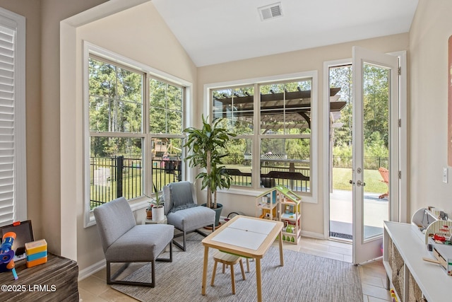 sunroom / solarium featuring visible vents