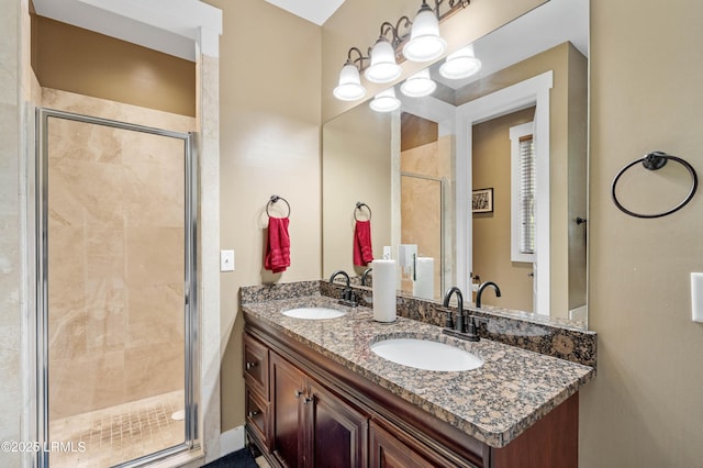 35 Sommer Lake Dr, Beaufort, SC 29902 - bathroom with double vanity, an inviting chandelier, a shower stall, and a sink