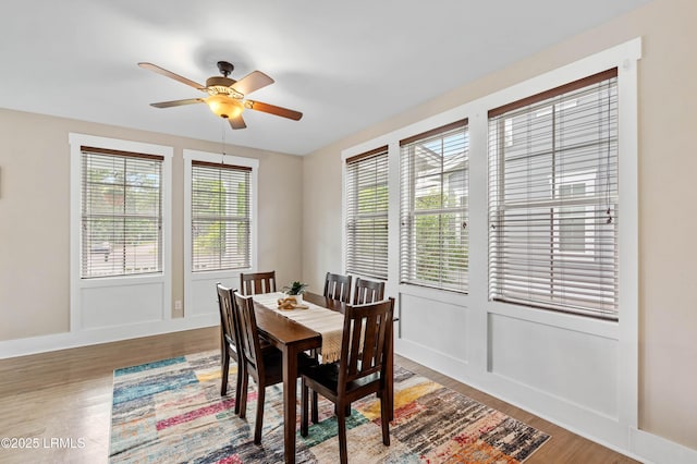 35 Sommer Lake Dr, Beaufort, SC 29902 - dining area featuring baseboards, ceiling fan, and wood finished floors