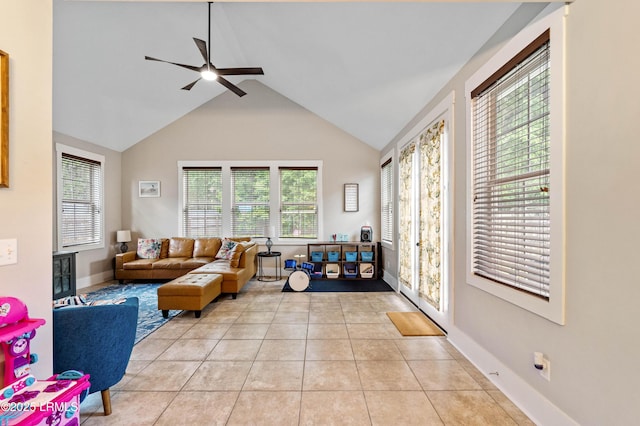 35 Sommer Lake Dr, Beaufort, SC 29902 - living room with light tile patterned floors, baseboards, a ceiling fan, and high vaulted ceiling