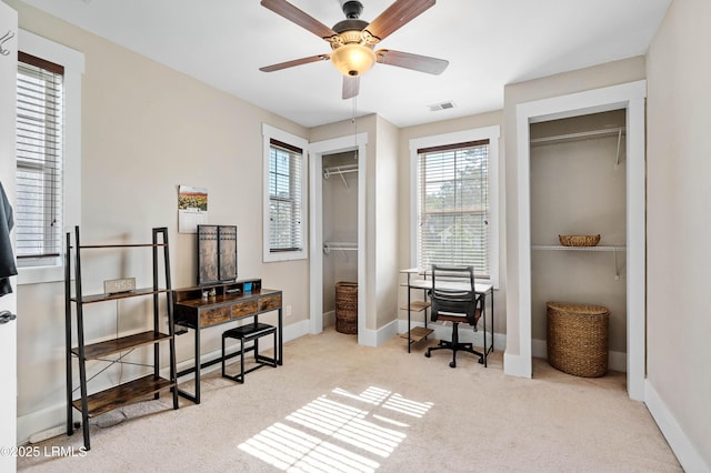 35 Sommer Lake Dr, Beaufort, SC 29902 - office space featuring a healthy amount of sunlight, a ceiling fan, carpet flooring, and visible vents