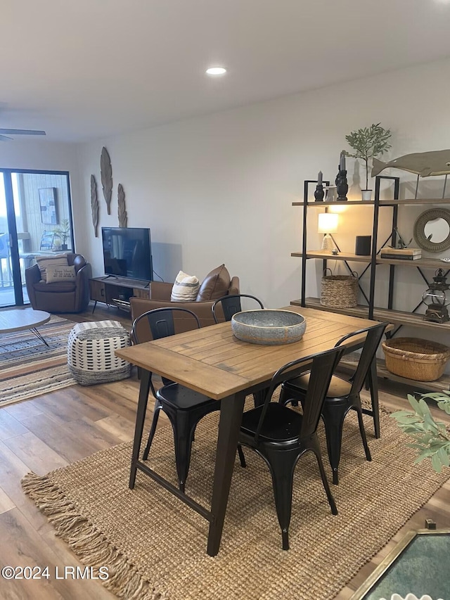 dining room with wood-type flooring