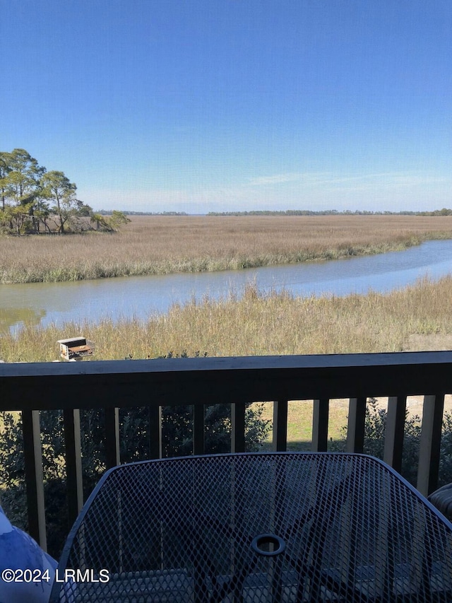 property view of water with a rural view