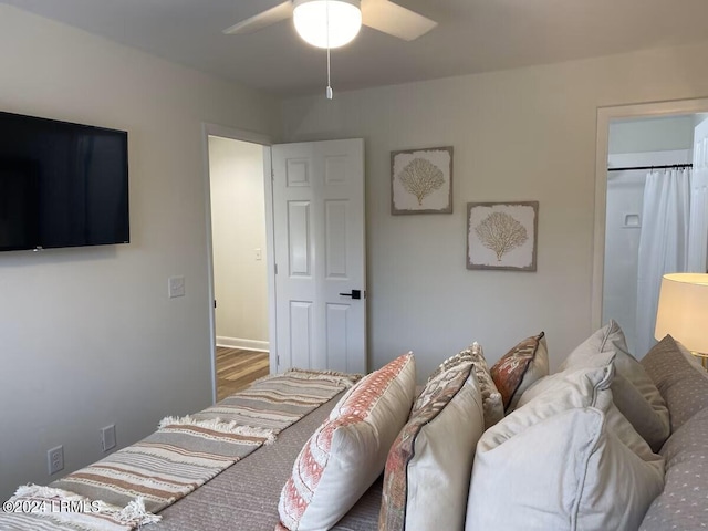 bedroom with wood-type flooring and ceiling fan