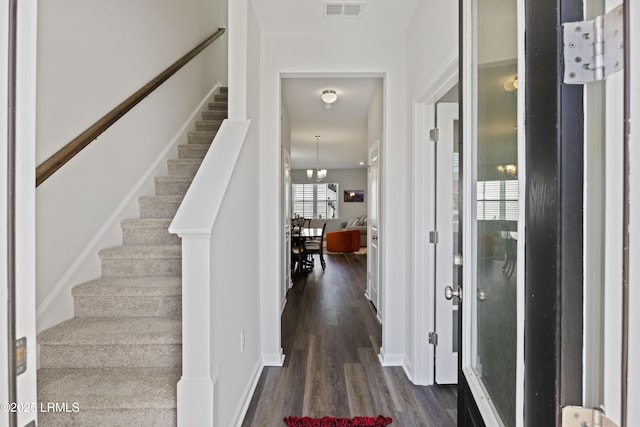 69 Garden Gate Ln, Hardeeville, SC 29927 - foyer entrance featuring dark wood-style floors and stairs