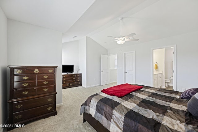 69 Garden Gate Ln, Hardeeville, SC 29927 - bedroom with vaulted ceiling, light colored carpet, connected bathroom, a ceiling fan, and baseboards