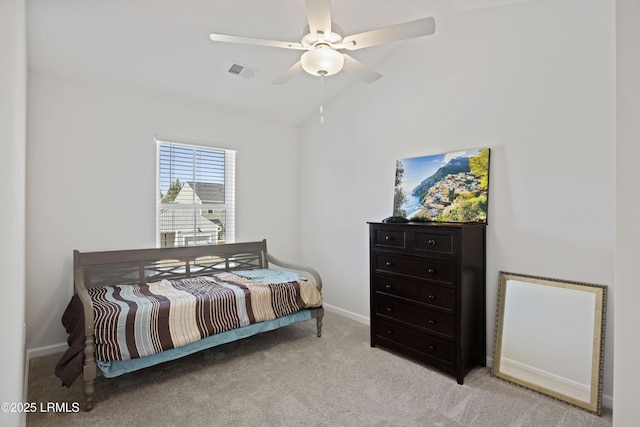 69 Garden Gate Ln, Hardeeville, SC 29927 - bedroom with light colored carpet, baseboards, vaulted ceiling, and a ceiling fan