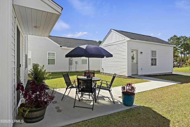 69 Garden Gate Ln, Hardeeville, SC 29927 - view of patio / terrace with an outdoor structure and outdoor dining space