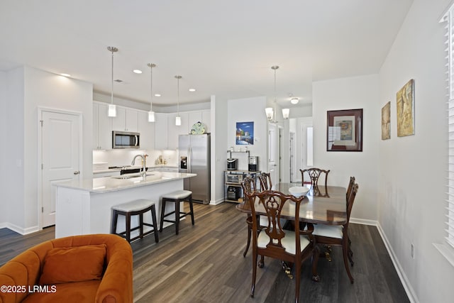 69 Garden Gate Ln, Hardeeville, SC 29927 - dining room with dark wood-style floors, baseboards, and recessed lighting