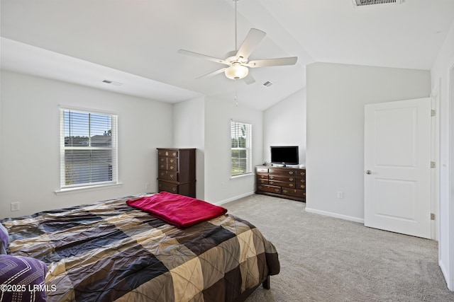69 Garden Gate Ln, Hardeeville, SC 29927 - bedroom with light carpet, lofted ceiling, baseboards, and a ceiling fan
