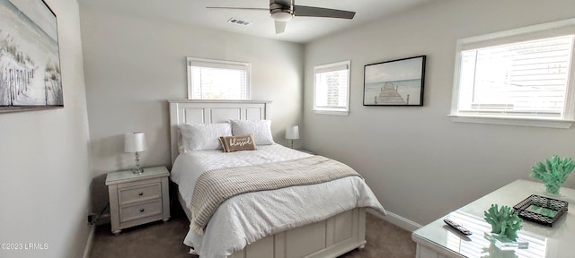1272 Windswept Oak Ln, Beaufort, SC 29902 - bedroom featuring dark carpet and ceiling fan
