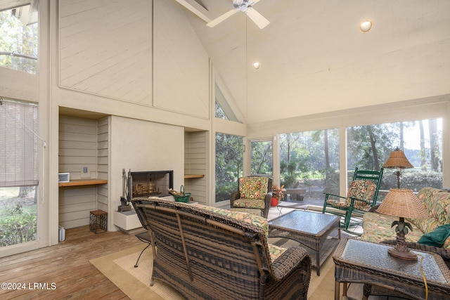 sunroom / solarium featuring vaulted ceiling and ceiling fan