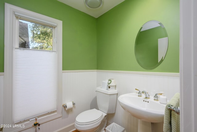 bathroom featuring sink and toilet